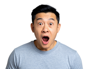 A close-up portrait of a surprised Asian man with a shocked and excited expression on his face on a transparent background.