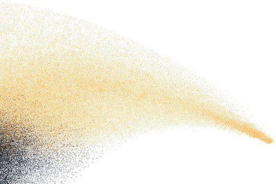 Light beige/tan colored particles, disbursed in a spray or explosion, against a dark gray background