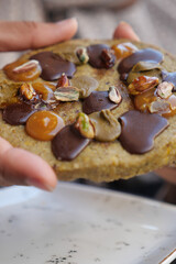 Delicious cookies featuring nuts and chocolate on a plate