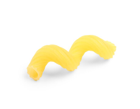 Uncooked cellentani pasta isolated on white background, closeup