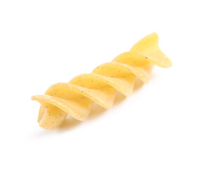 Tasty raw fusilli pasta isolated on white background, closeup