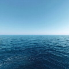 Obraz premium Realistic photo of the vast ocean, with clear blue water and sky, featuring the horizon line. The sea is calm, without any waves or splashes. There is no land in sight on either.
