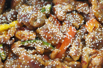 Delicious stir fried chicken with vegetables and sesame
