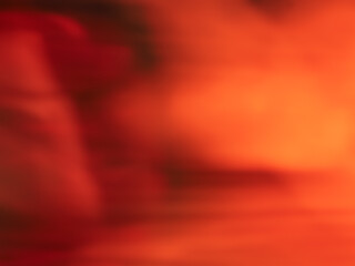 Orange blur light in the dark for abstract background