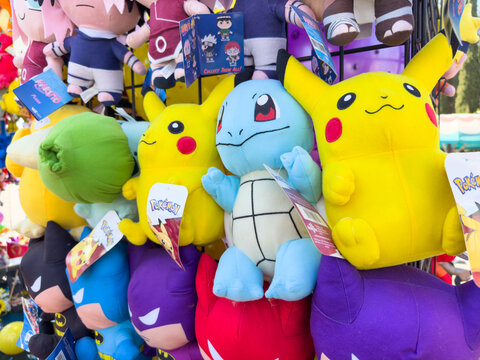 Pokemon Plush Toy Display at Fair Booth


