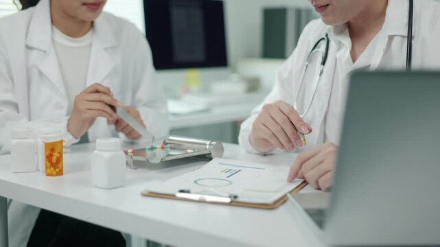 Consultation on patient medication healthcare office medical meeting clinical environment close-up view pharmaceutical management