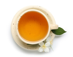 Cup of hot jasmine tea with flowers on white background
