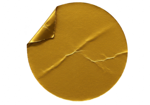 A round gold sticker with a peeling corner and visible creases is shown against a transparent background - Powered by Adobe