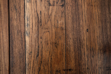 Obraz premium A detailed close-up of a natural rock surface featuring intricate brown, grey, and white mineral patterns and veins.