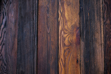 Obraz premium A detailed close-up of a natural rock surface featuring intricate brown, grey, and white mineral patterns and veins.