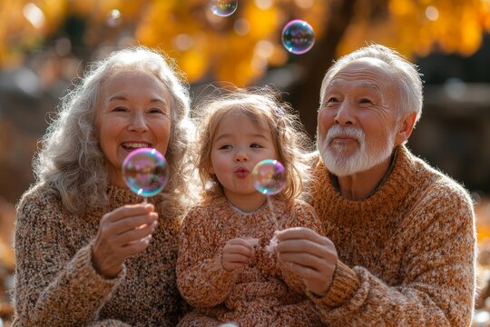Grandparents and their granddaughter enjoying a fun moment together outdoors, blowing bubbles in the garden on a warm autumn day, capturing the joy of intergenerational family, Generative AI