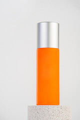 Skin care or sunscreen cosmetic with stylish props on white background.