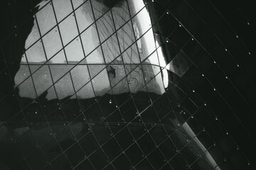 black and white abstract architectural poster background, modern office glass building with glass panels in grid 