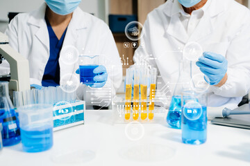 Fototapeta premium Scientists in a high tech lab conduct research with pipettes and tablets, blending medical innovation, data science, and futuristic digital healthcare technology.