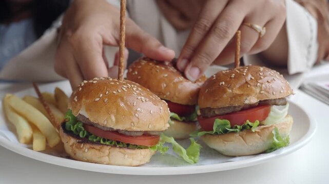Enjoying delicious burgers at a local diner with friends