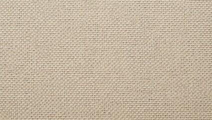 Fototapeta premium A close-up view of textured fabric showcasing a neutral beige color and intricate weave, perfect for design projects.