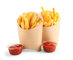 Paper boxes with tasty french fries and ketchup on white background