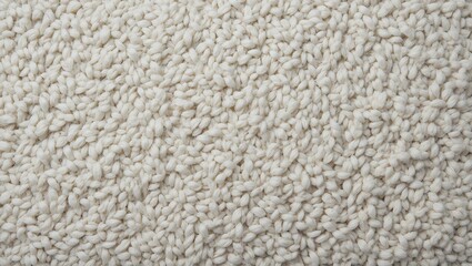 Soft texture of a cozy beige carpet, adding warmth and comfort to any living space in a modern home environment.