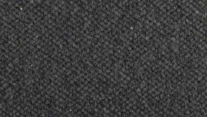 Textured black fabric surface ideal for backgrounds, patterns, and various design projects.