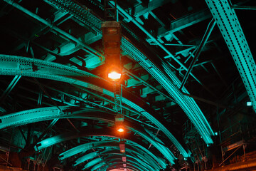 architecture of a steel bridge in green light