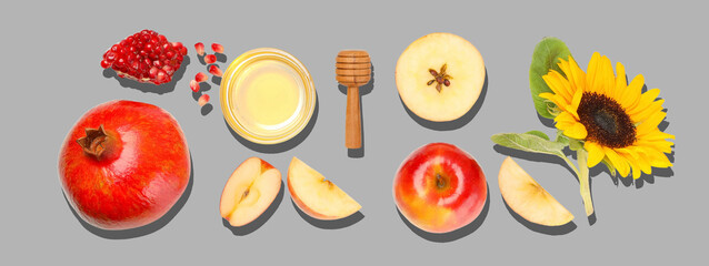 Colorful fruits and honey create a beautiful display with sunflower