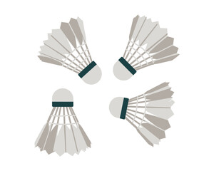 Four badminton shuttlecocks arranged in a circle isolated on white background, creating a dynamic and sporty composition for graphic design projects