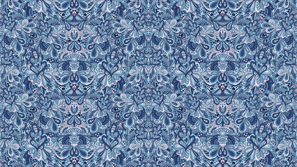 A complex blue and white floral pattern with repeating symmetrical designs and intricate details