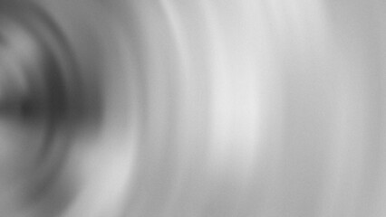 Soft grayscale monochrome abstract background with radial gradient subtle grain noise texture. minimalist designs presentations, website banner header wallpaper backdrop.