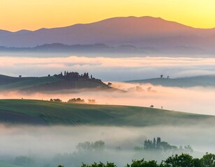Obraz premium Misty sunrise over rolling green hills and a traditional farmhouse in the picturesque Tuscan countryside.