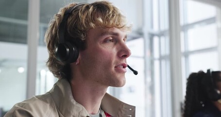 Call center, help desk and man with feedback for tech support, software query or coworking. Contact us, headset or happy agent talking for IT solution, customer service or inbound for troubleshooting - Powered by Adobe