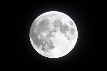 Fototapeta premium Full Moon Glowing Brightly in Clear Night Sky Against Darkness, Displaying Lunar Surface and Detailed Craters and Texture