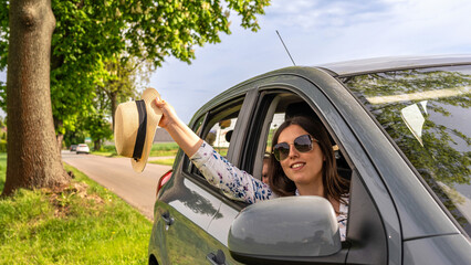 Travel car. Family trip countryside vehicle. Parents daughter outdoor road summer.