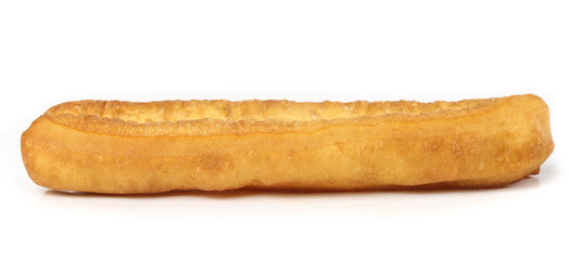 Crispy big doughnut served as a traditional snack enjoyed in a lively local market during the afternoon