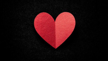 Obraz premium Red heart cutout on dark textured background