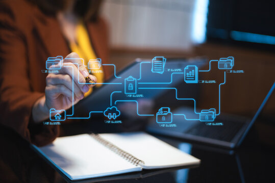 Modern businesswoman using a stylus to interact with digital data flow on tablet. Concept of cloud storage, cybersecurity