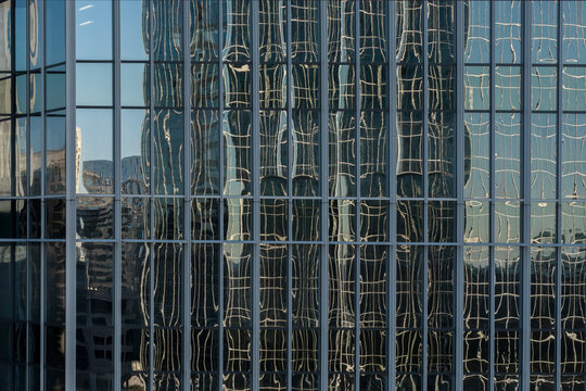 Reflections of a Skyscraper on an Office Building in Atlanta, Ge