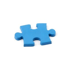 Fototapeta premium Single blue puzzle piece isolated against a white backdrop, symbolizing connection and problem-solving.