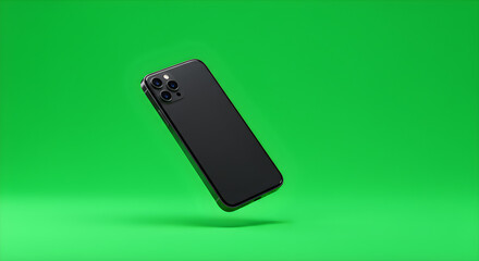 Sleek black smartphone with triple lens camera system angled on a vibrant green surface.
