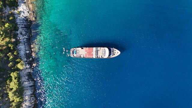 Aerial drone brids eye view of boats cruise ships sailing adriatic sea croatia