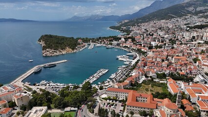 Makarska city town croatia coastal adriatic drone aerial view Dalmatian coast Biokovo mountains