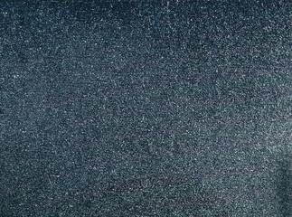 The metal surface is silver-colored