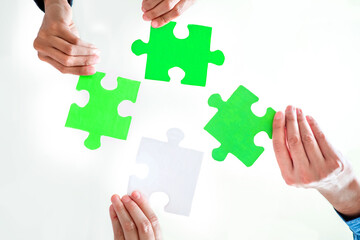 ESG Concept of teamwork and partnership Hands join Jigsaw puzzle pieces with global community sustainable Save Earth