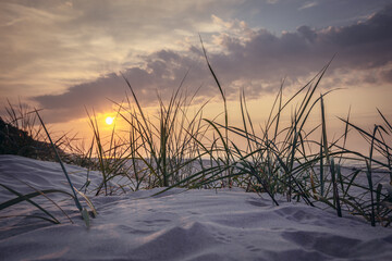 Fototapeta premium Evening on a beach in Katy Rybackie, small resort village located on the Vistula Spit on the Baltic Sea coast in Pomerania region of Poland