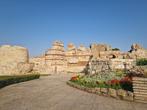 Ancient ruins of Nessebar, weathered brick and stone walls remnants of Byzantine fortress structure. Thracian settlement Mesembria now the old town of Nesebar, UNESCO world heritage in Bulgaria