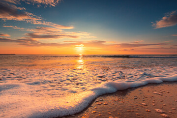 Sea wave close up, low angle view, sunrsie shot