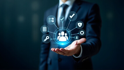 Businessman Holding Holographic HR Interface with Team Management Icons