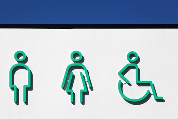 Toilet and restroom symbol on a wall	