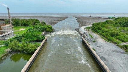 Drone perspective of the Water Transfer Bridge applying engineering and technology solutions to enhance water flow to the sea, effectively preventing flooding and managing water resources.
