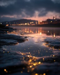 City lights reflected in a shallow pool at dawn