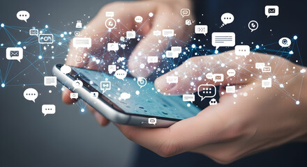 Person using smartphone with floating social media message and notification icons representing digital communication and networking